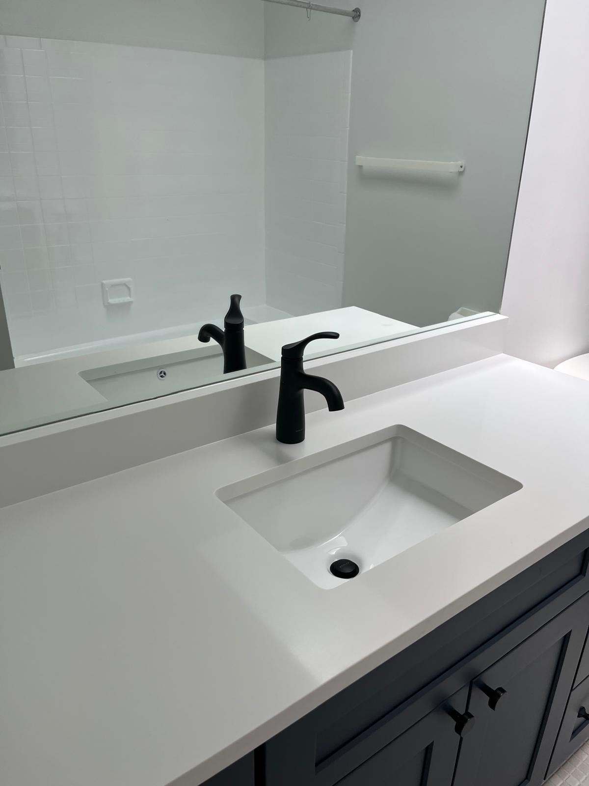 Post-renovation bathroom vanity cleaning on Long Island