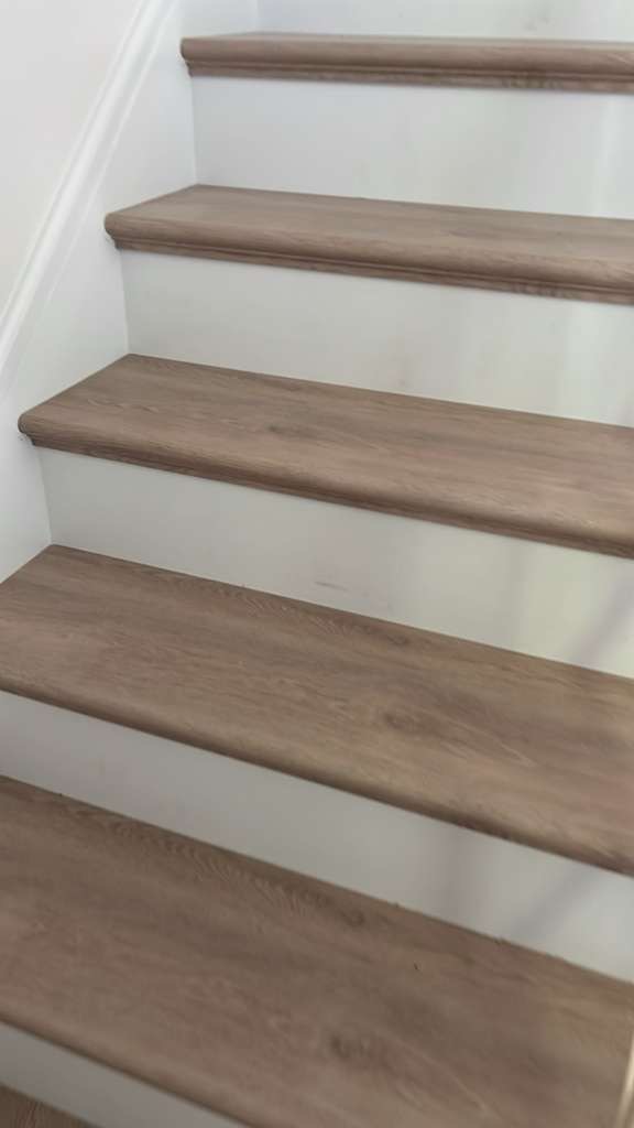 Staircase post-construction cleaning by Long Island Maids